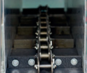 Chain conveyor tension terminal.
